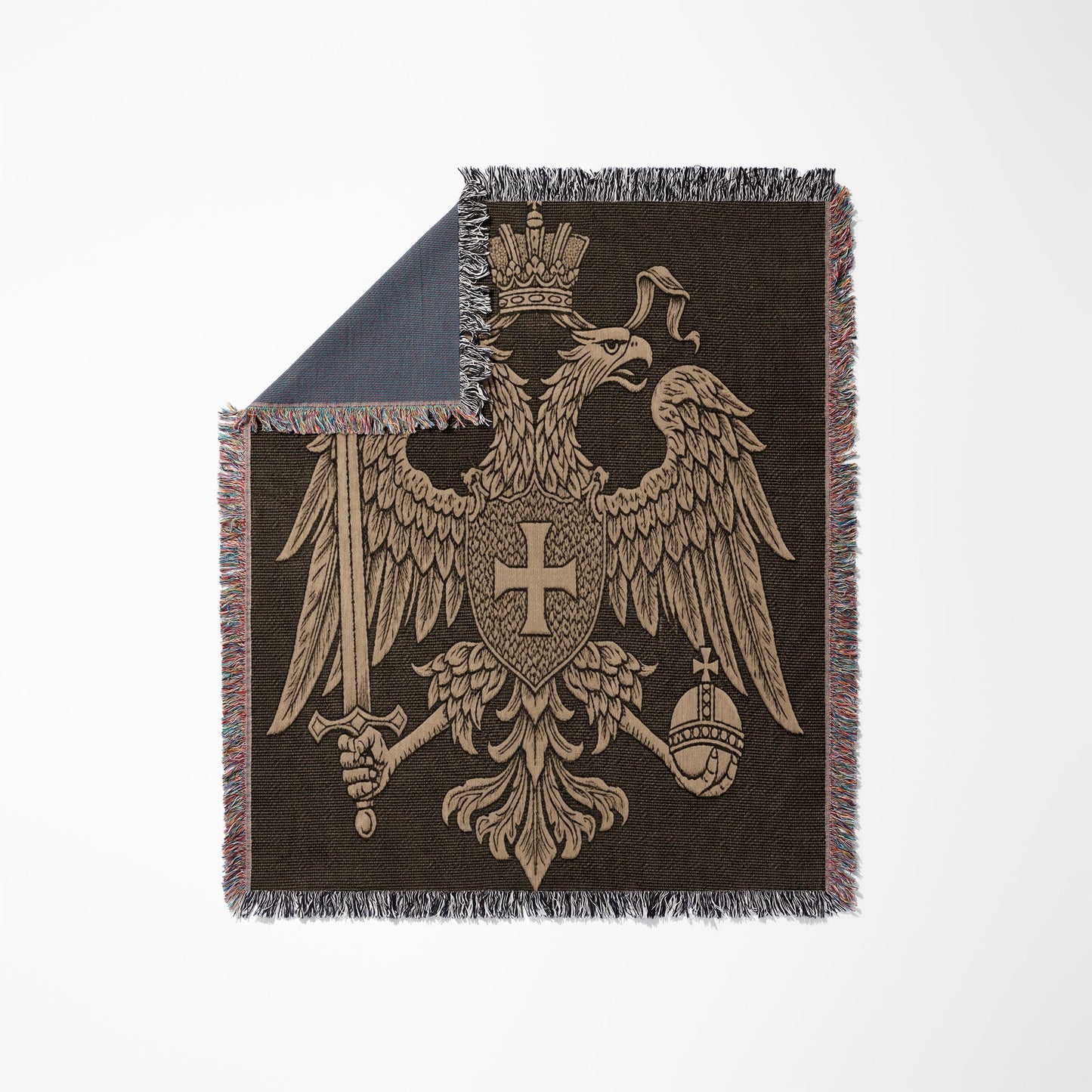 Tapestry blanket with double-headed eagle crest and crown.