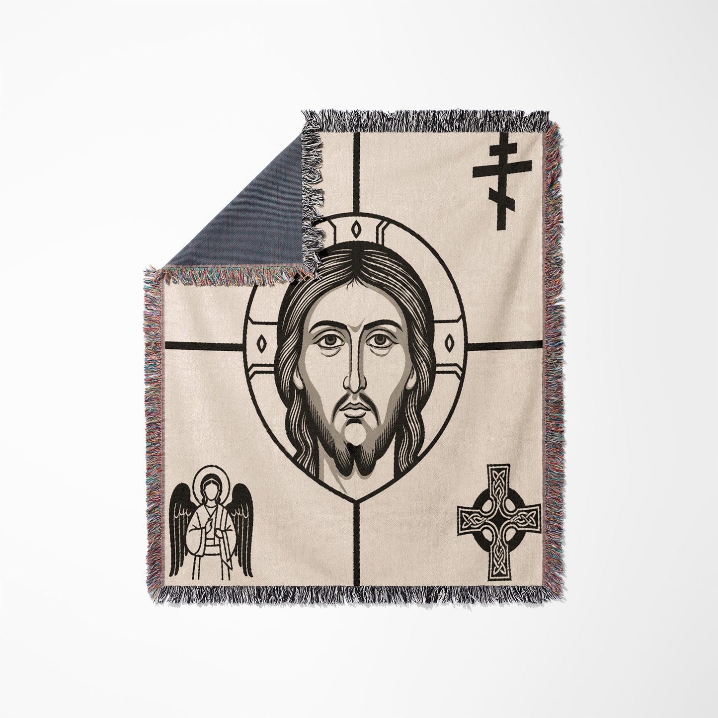 Icon of Jesus with an angel and Celtic cross on a woven blanket.