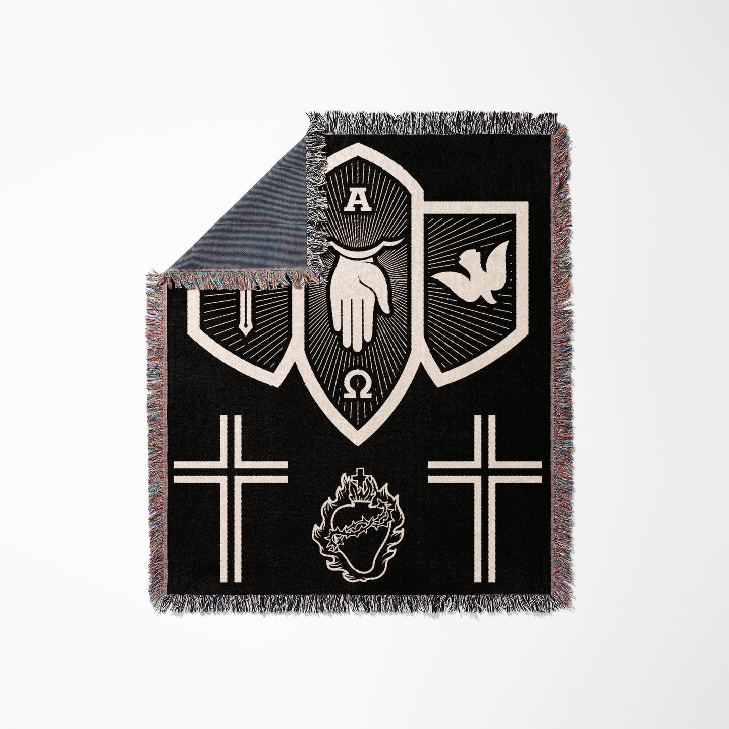 Black blanket with shield, hand, dove, crosses, and flaming heart symbols.