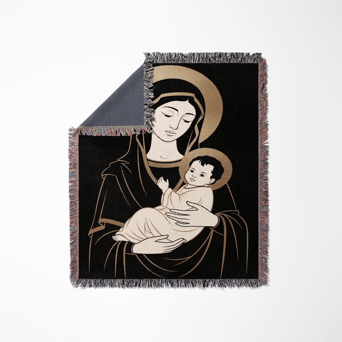 Madonna and Child illustration on a fringed throw blanket.