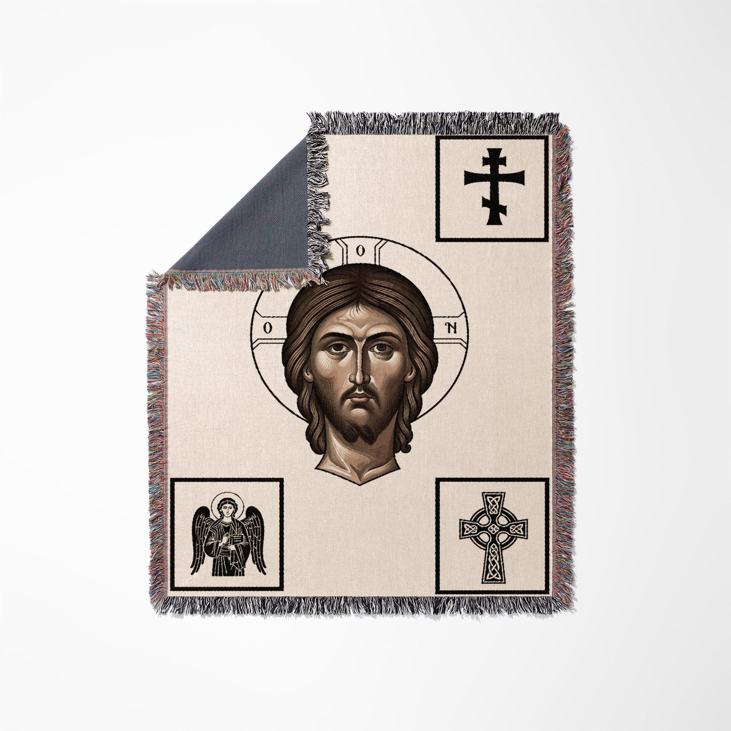 Woven blanket with Jesus Christ icon and Celtic knot designs.