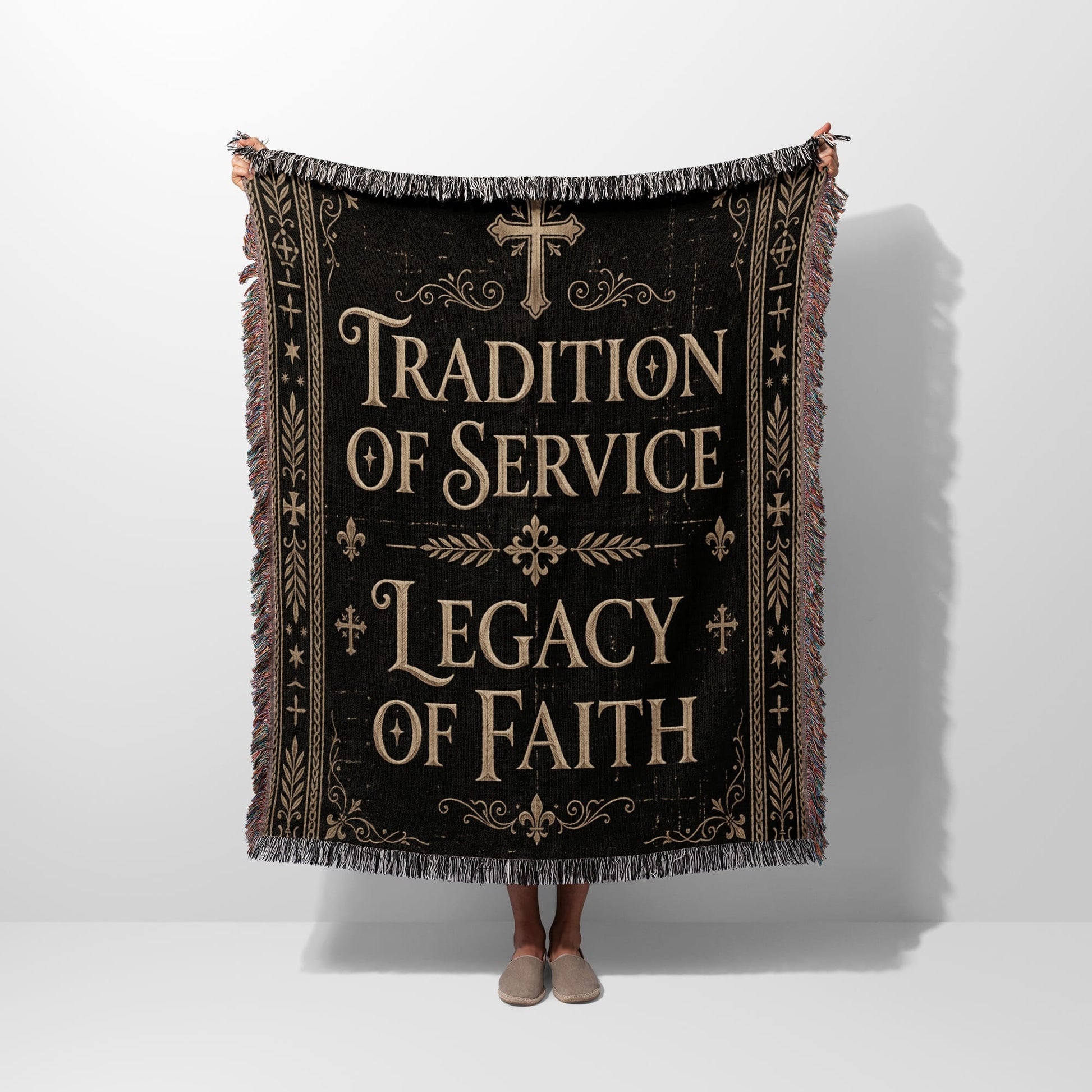 Black woven blanket with "Tradition of Service Legacy of Faith" text and Christian symbols.