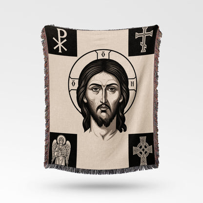Tapestry featuring a portrait of Jesus surrounded by Christian symbols.