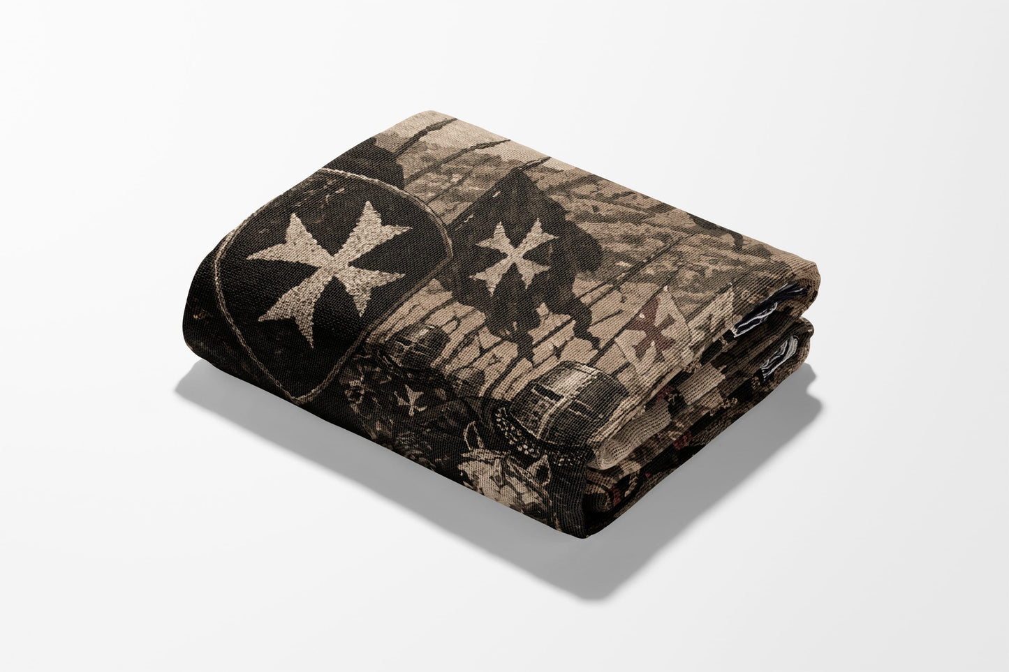 Folded blanket with cross and helmet design.