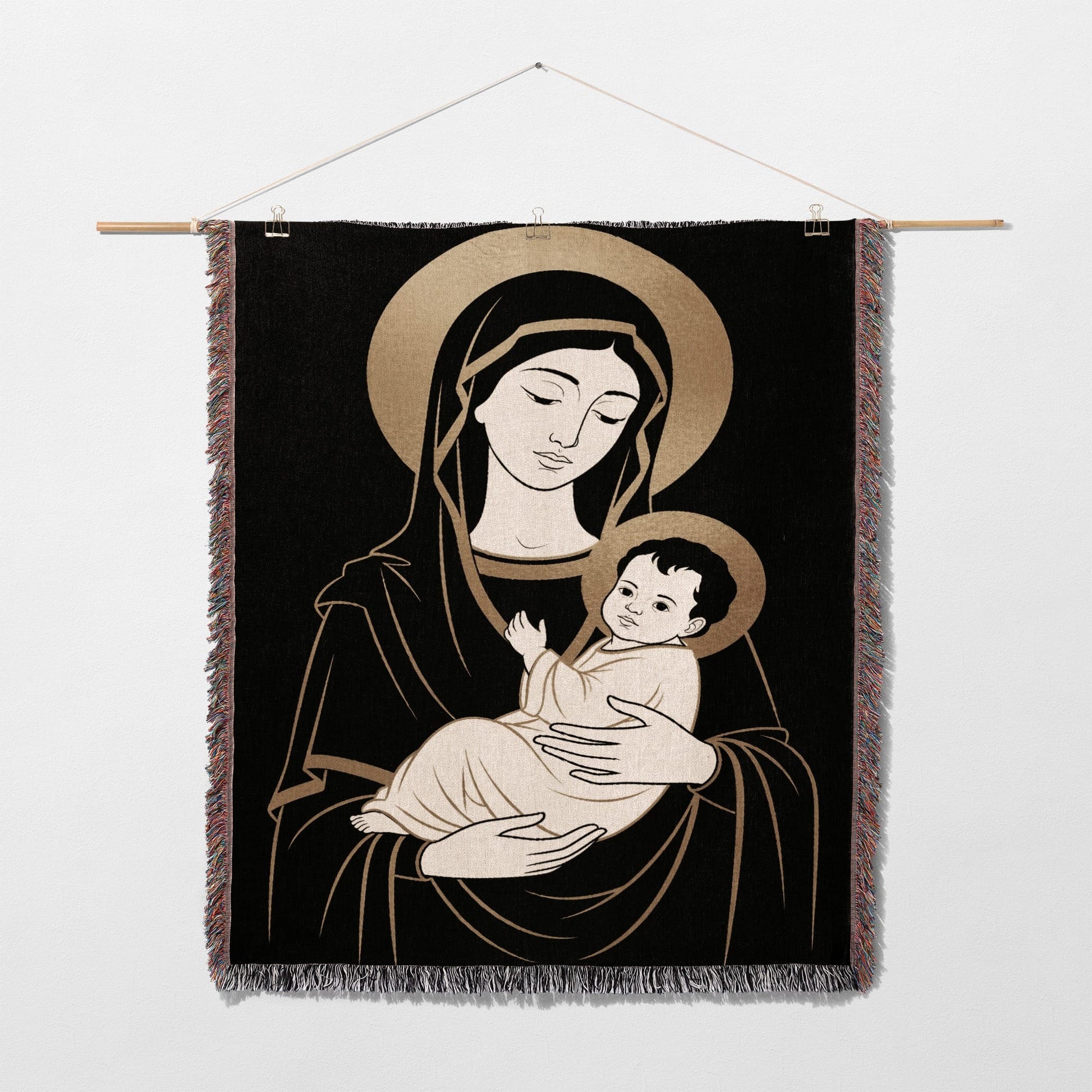 Tapestry with gold haloed Mary holding baby Jesus against black background.