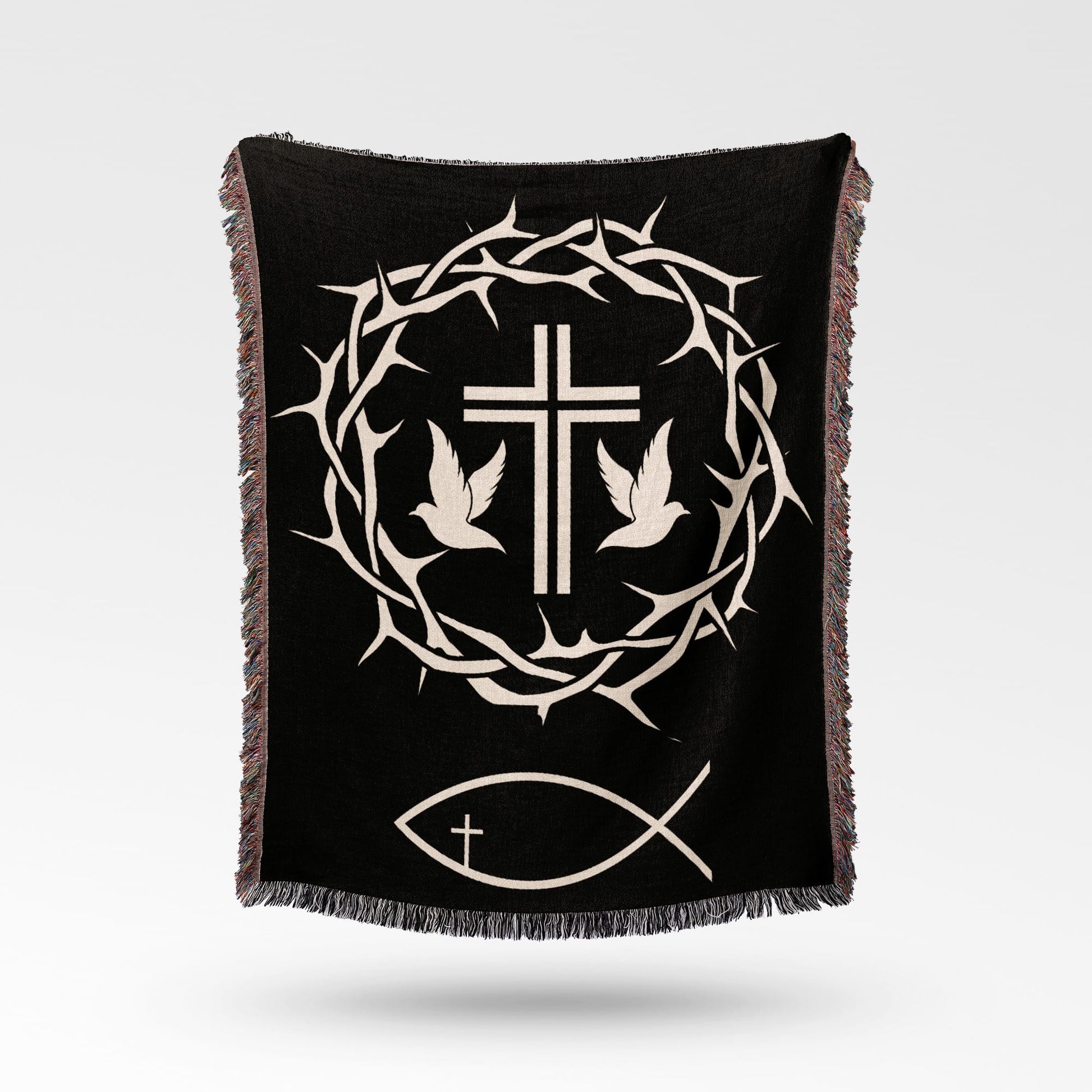 Black woven throw blanket with Christian symbols: cross, crown of thorns, doves, and fish.
