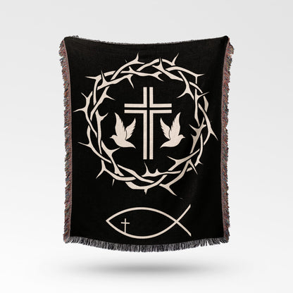 Black woven throw blanket with Christian symbols: cross, crown of thorns, doves, and fish.