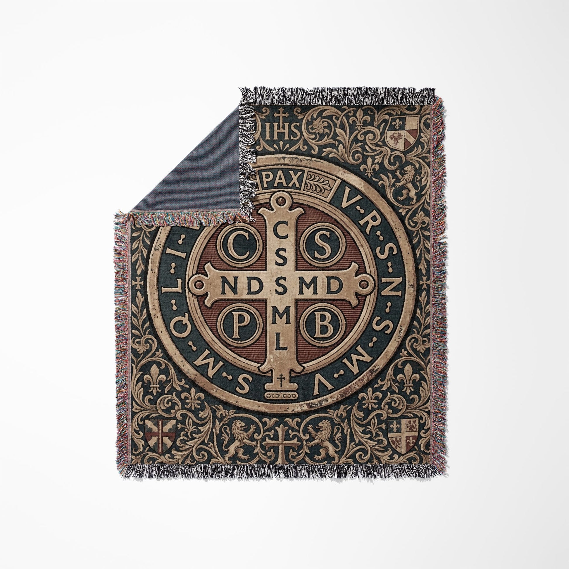 Woven blanket with Saint Benedict medal design featuring IHS and PAX text.