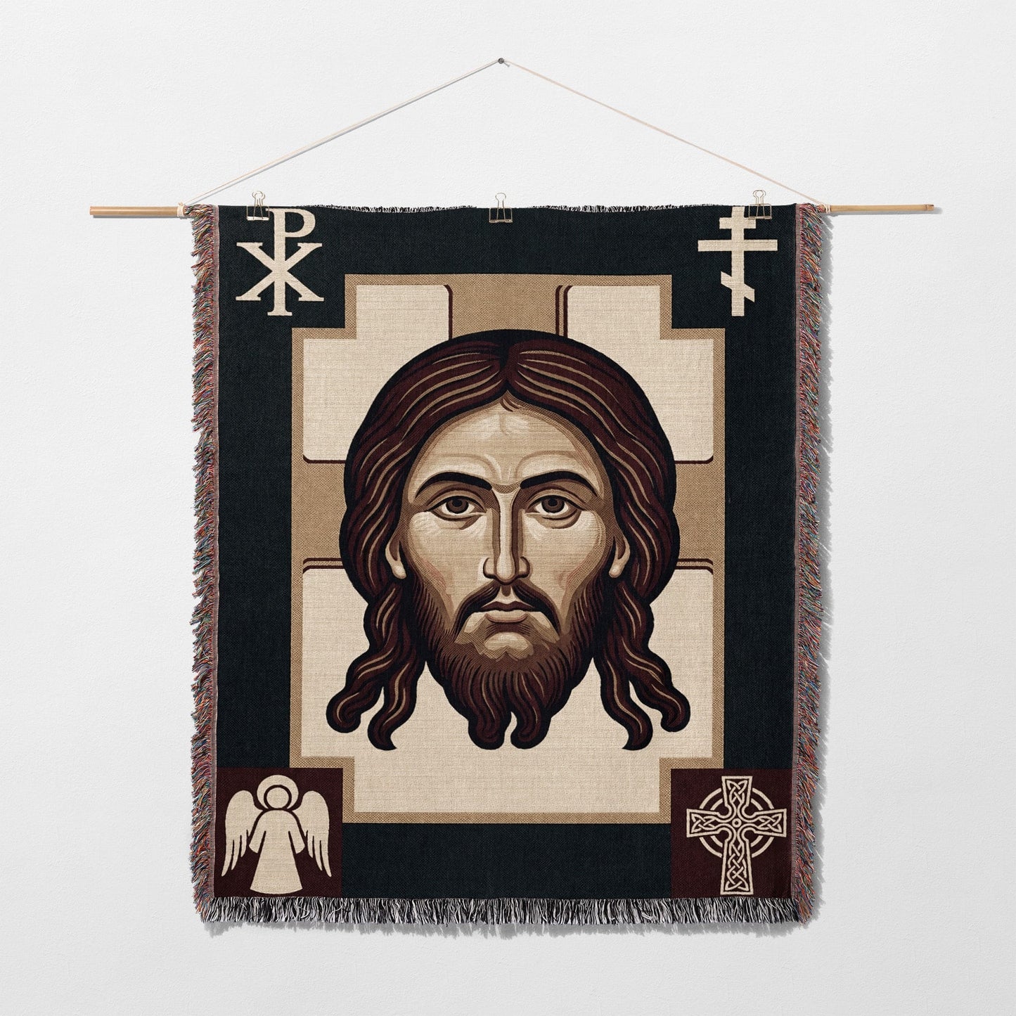 Icon of Jesus Christ with cross and angel motifs on woven tapestry.