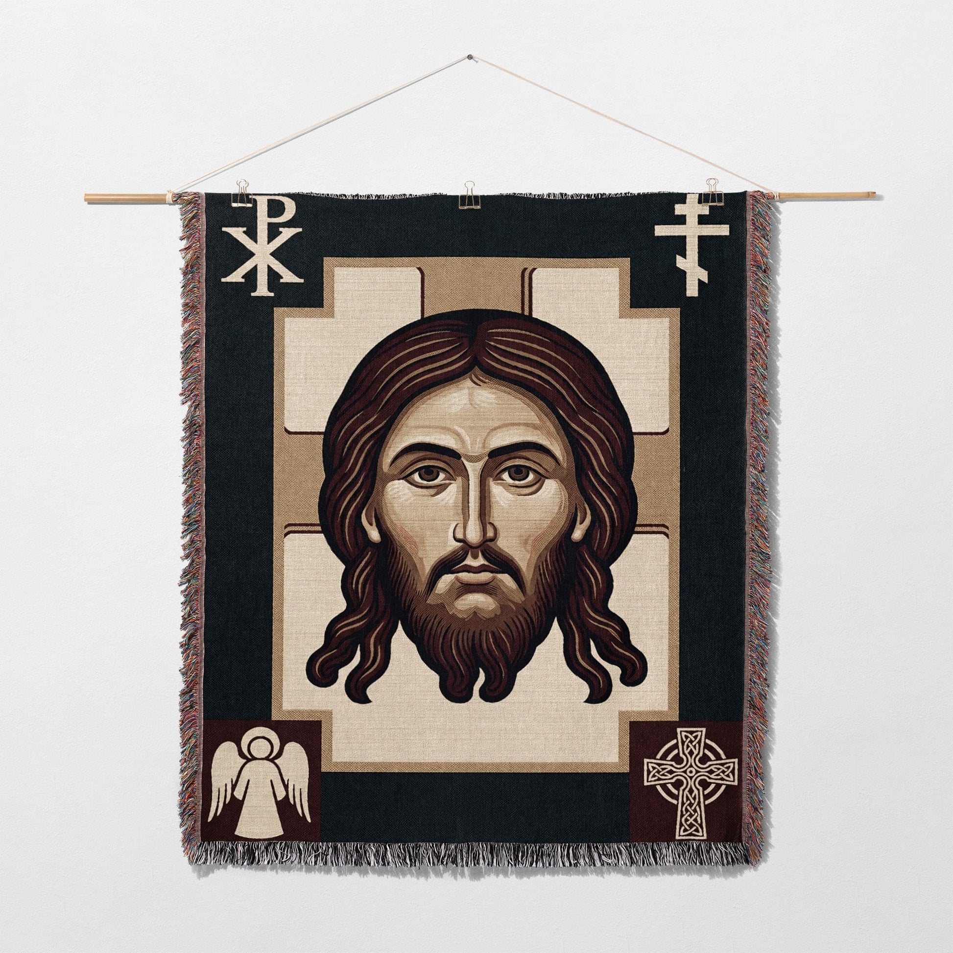Icon of Jesus Christ with cross and angel motifs on woven tapestry.