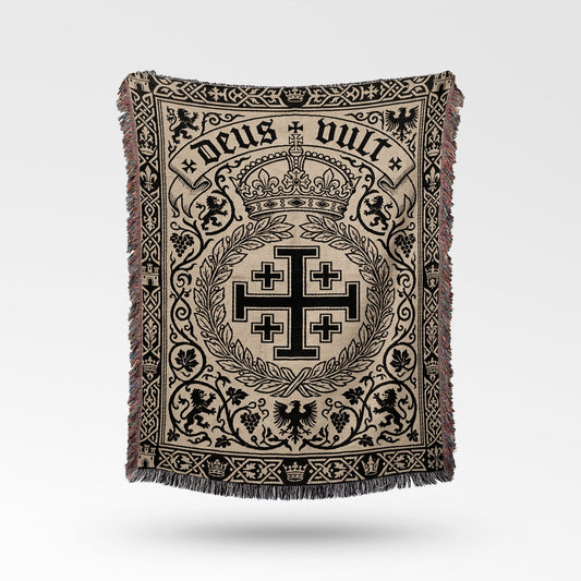 Tapestry blanket featuring "Deus Vult" and a Jerusalem cross emblem.