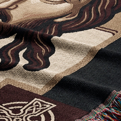 Woven tapestry detail with a lion's mane and Celtic knot design.