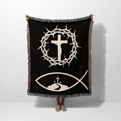 Black blanket with a Jesus fish symbol, crown of thorns, and three crosses.