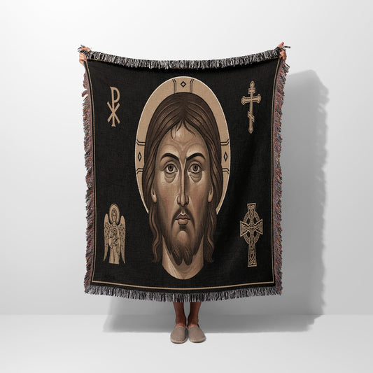 Woven tapestry blanket with Jesus Christ's face, chi rho, and celtic cross.
