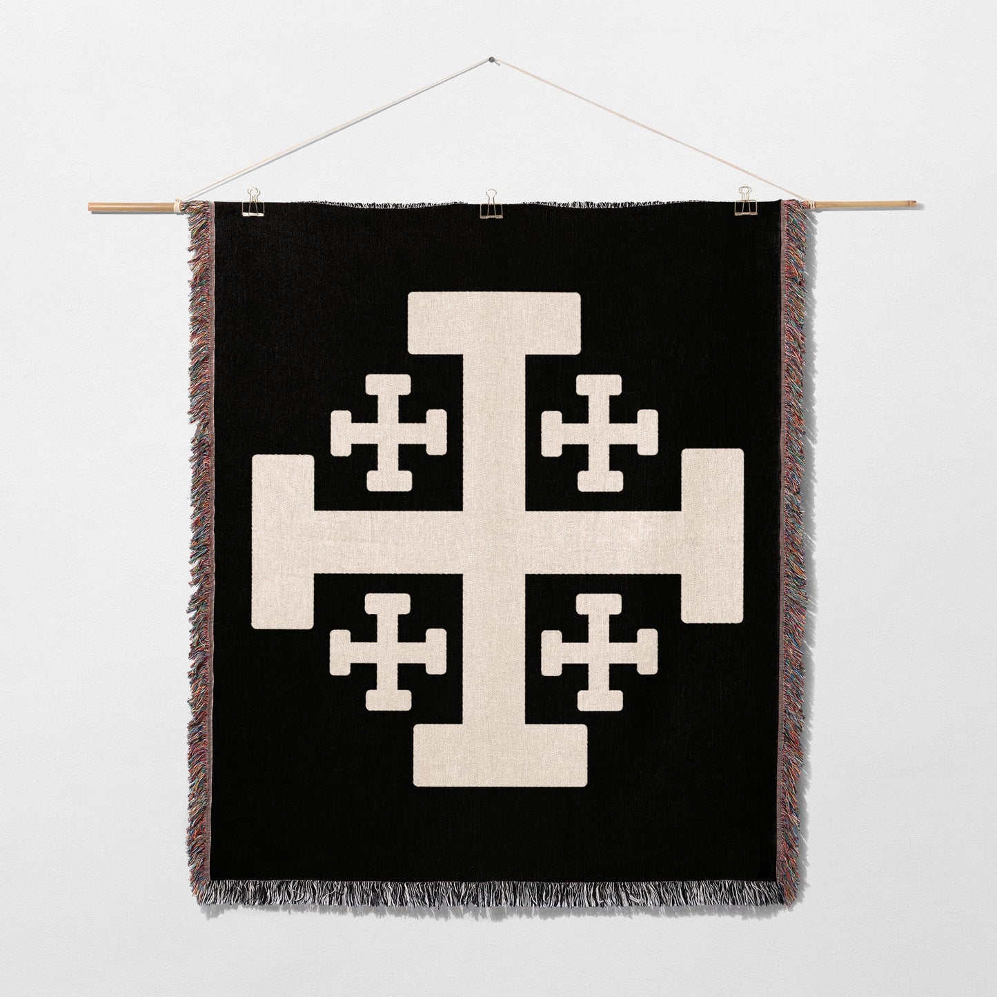 Black tapestry with a large white Crusader's Cross design.