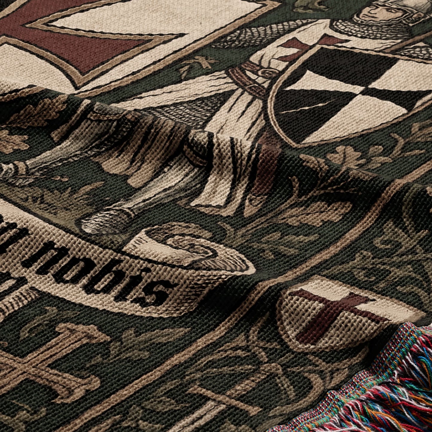 Woven tapestry depicting knights, shields, and text "nobis" with tasseled edges.