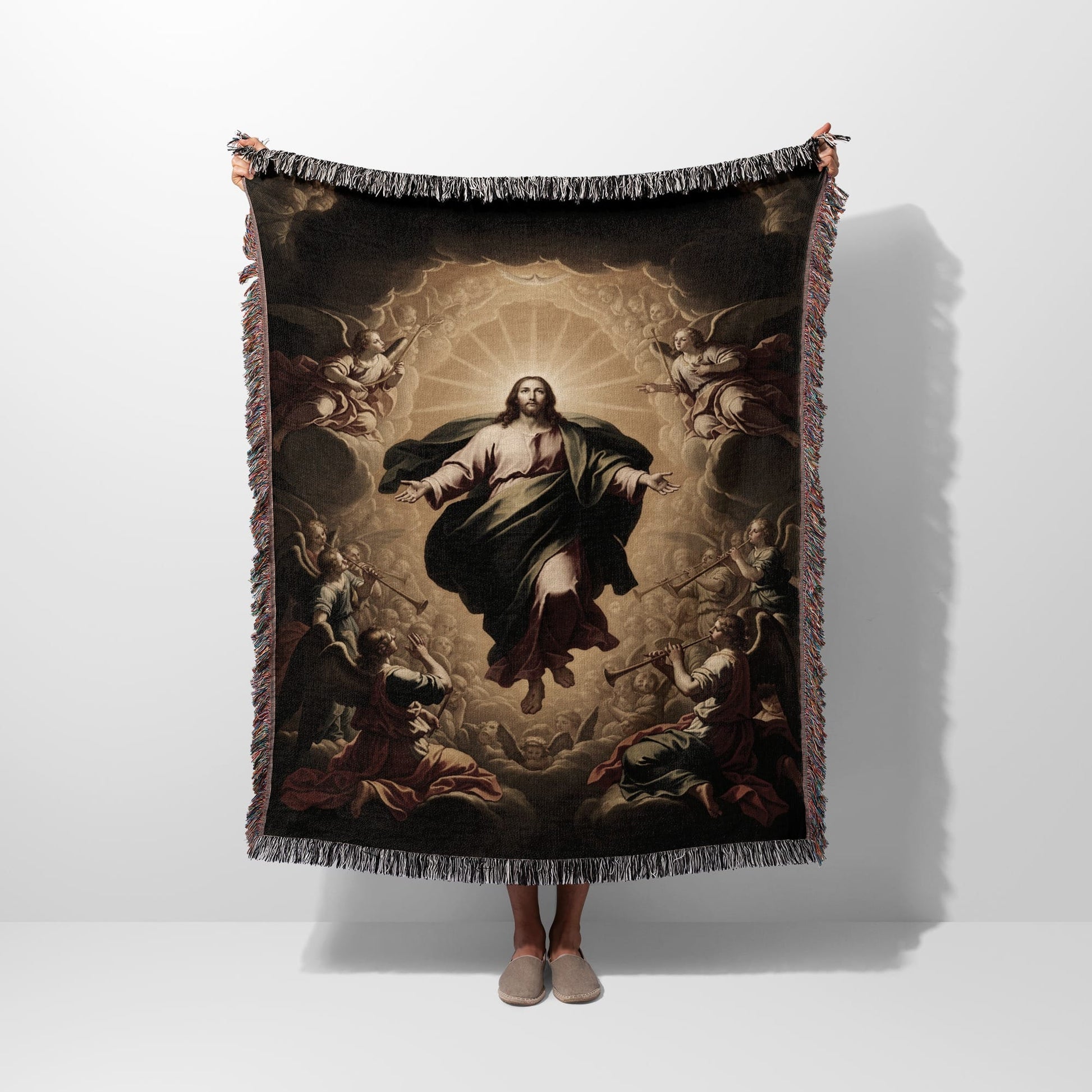 Jesus ascending with angels surrounding him, depicted on a woven blanket.