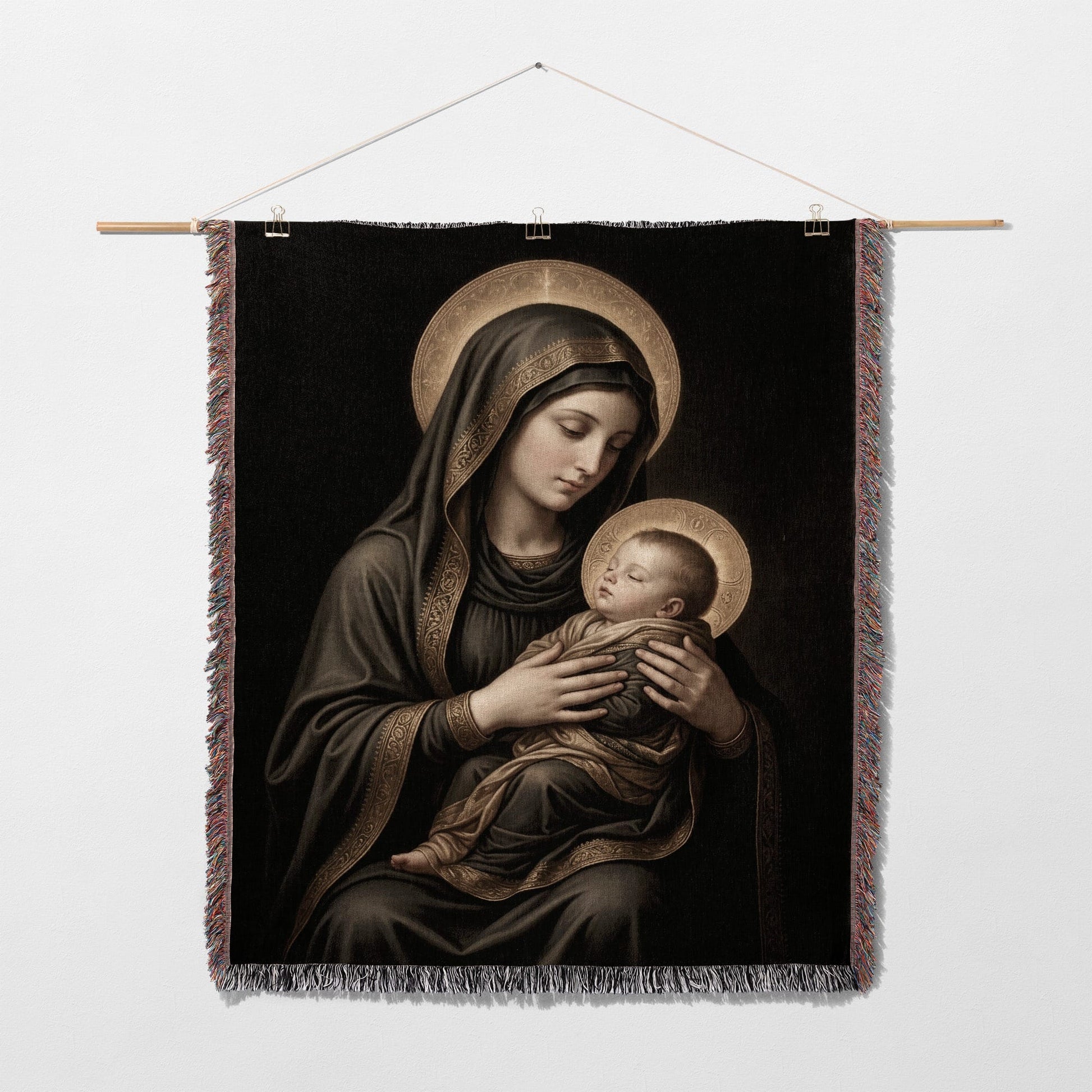 Madonna and Child artwork, depicting Mary holding baby Jesus with golden halos.