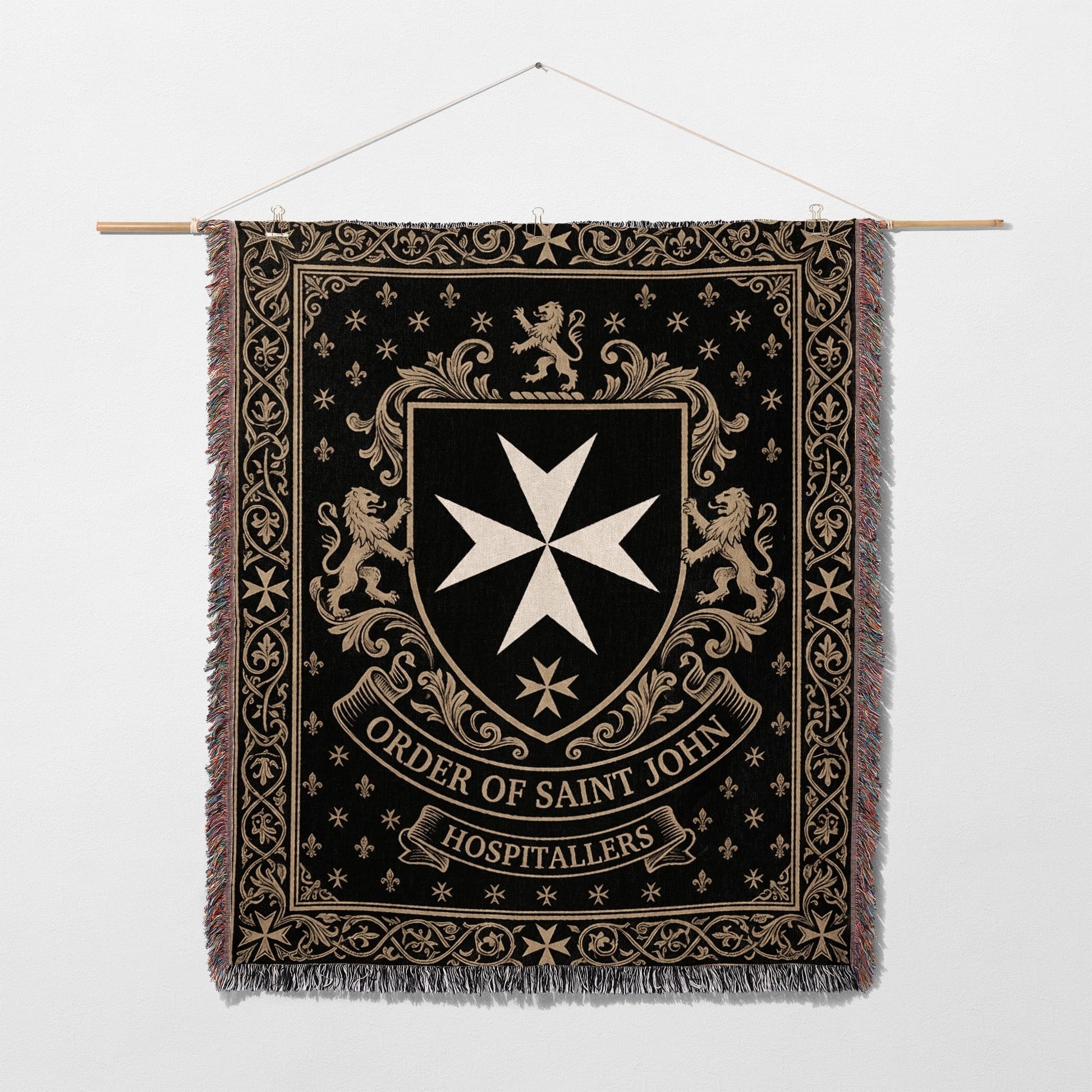 Black tapestry with Order of Saint John crest and lions.