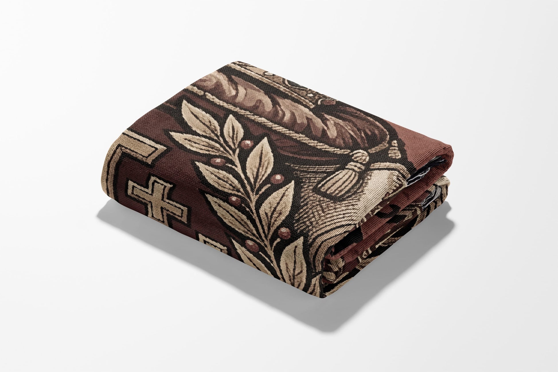 Folded tapestry with ornate, vintage-style pattern of leaves, berries, and tassels.