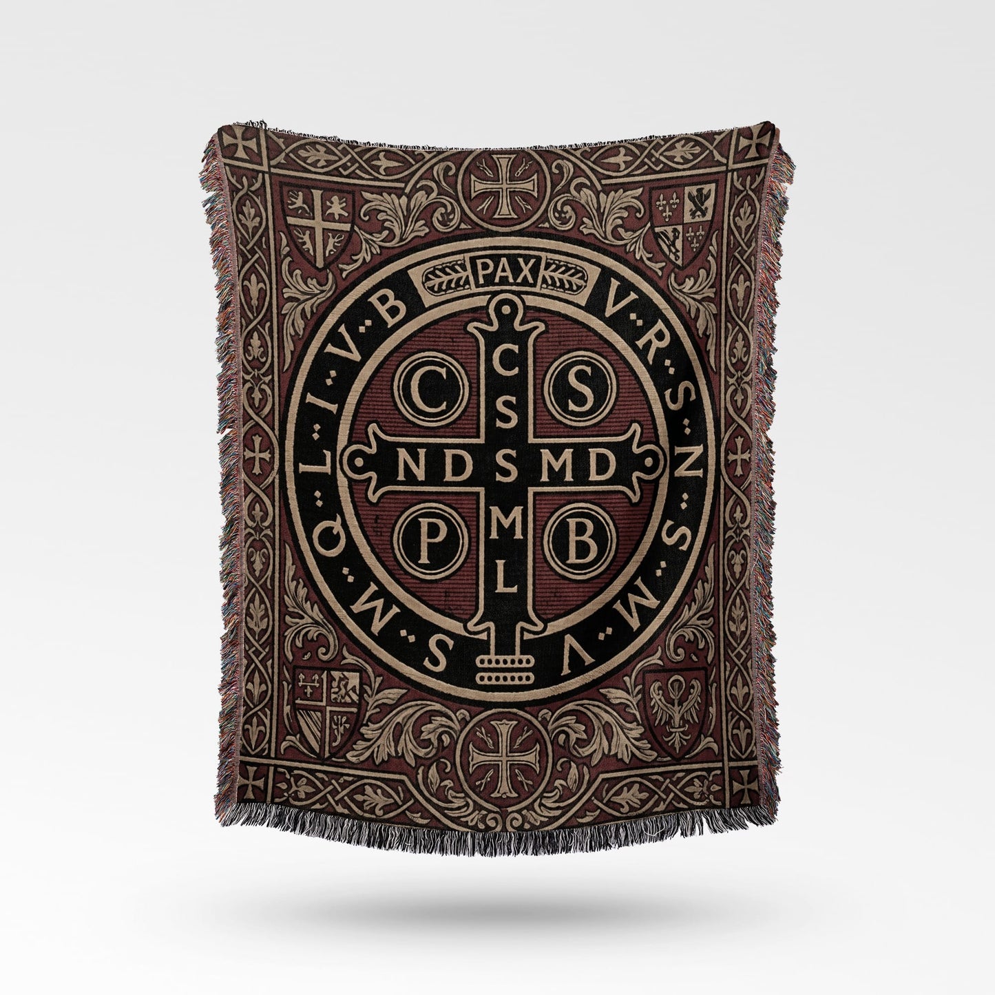 Woven tapestry throw with Benedictine medal design and intricate borders.