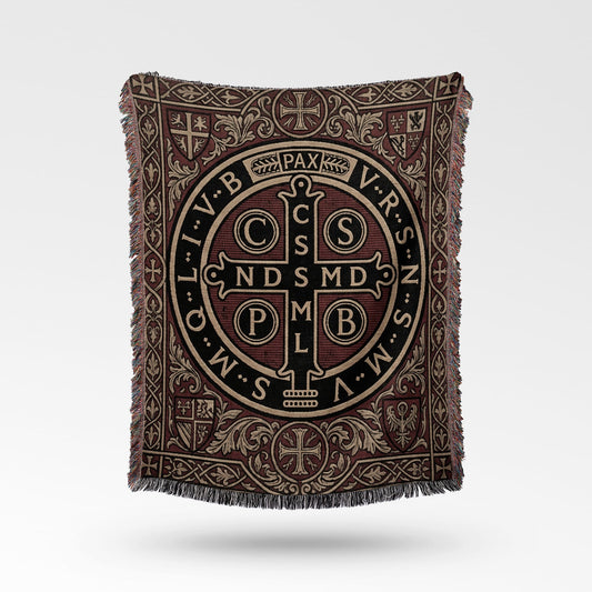 Woven tapestry throw with Benedictine medal design and intricate borders.