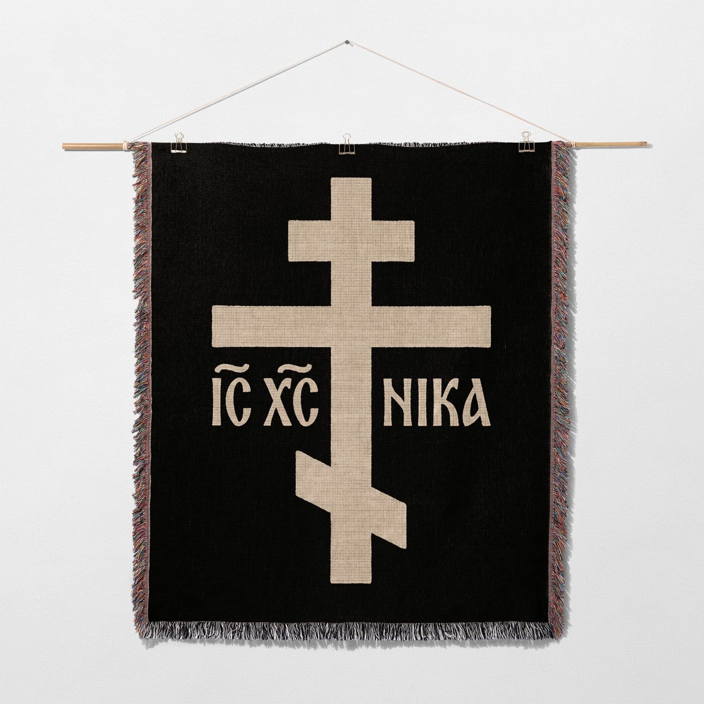 Black tapestry with a beige Orthodox cross and "IC XC NIKA" text.