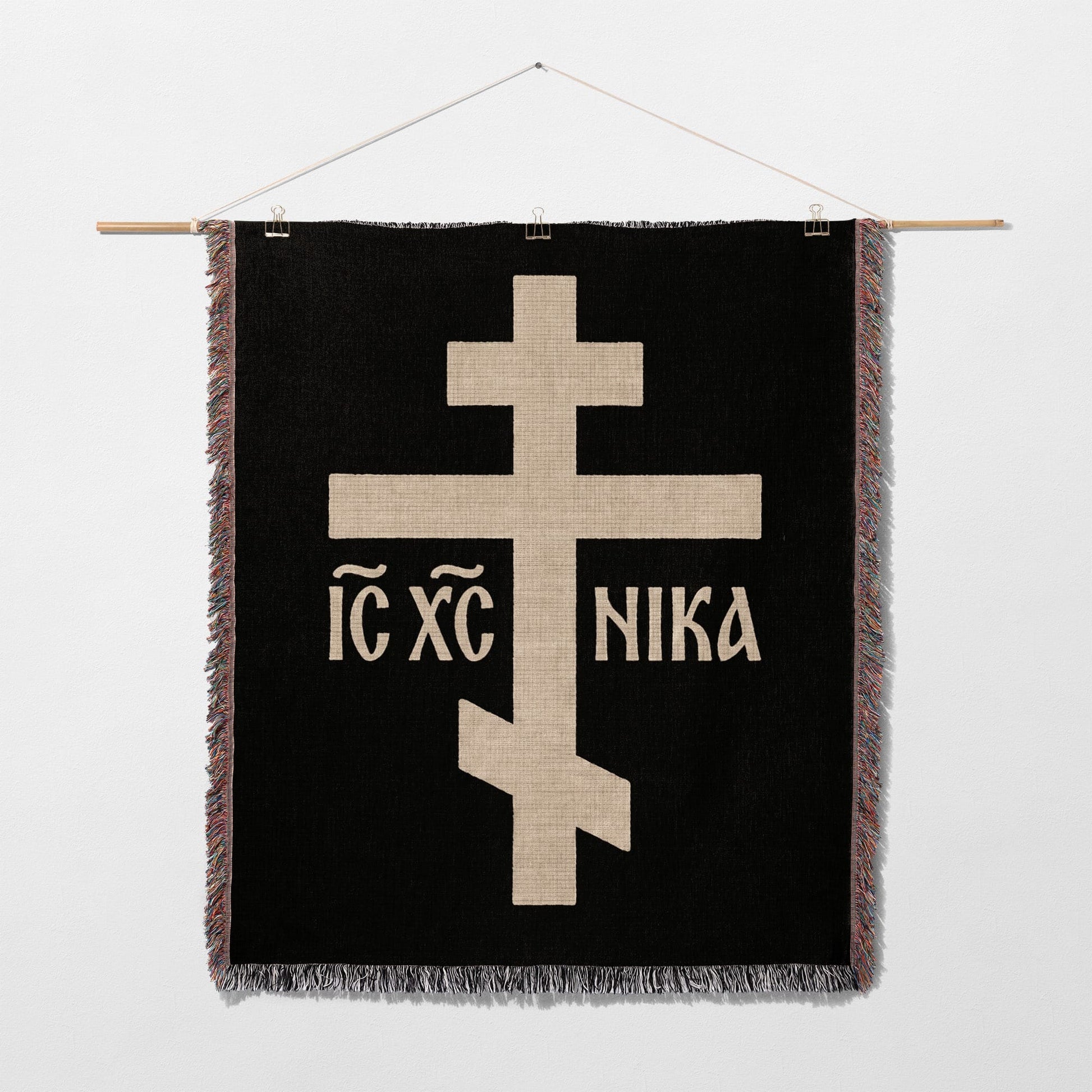 Black tapestry with a beige Orthodox cross and "IC XC NIKA" text.