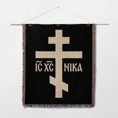 Black tapestry with a beige Orthodox cross and "IC XC NIKA" text.