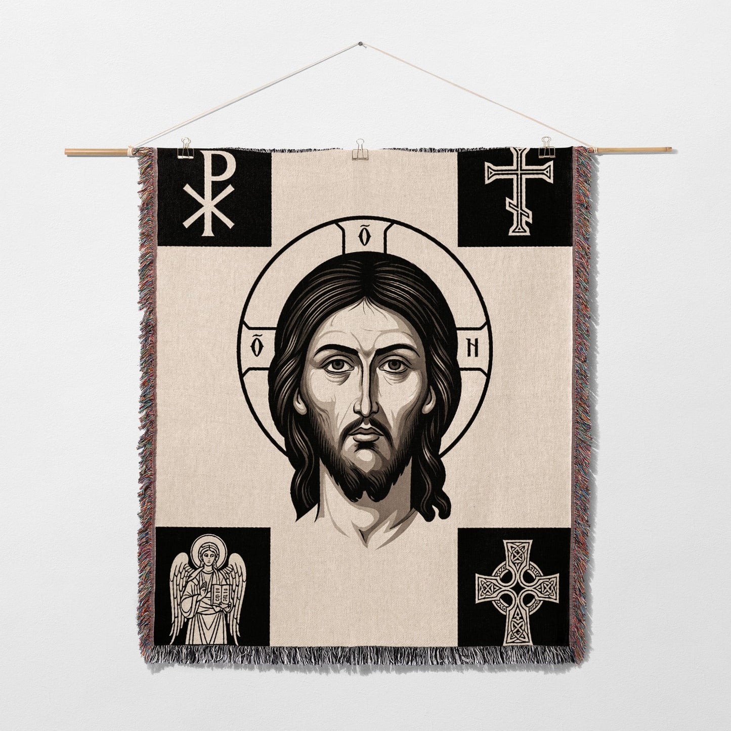 Tapestry featuring Jesus' face, halo, and religious symbols.