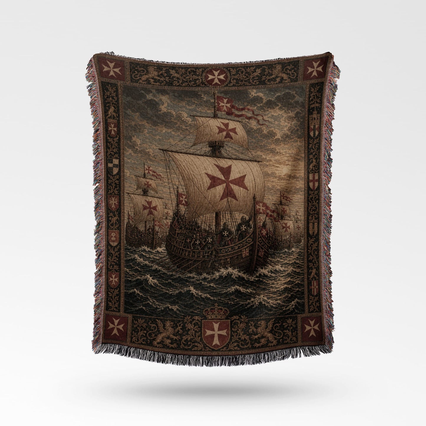 Tapestry blanket with sailing ships and Maltese crosses.