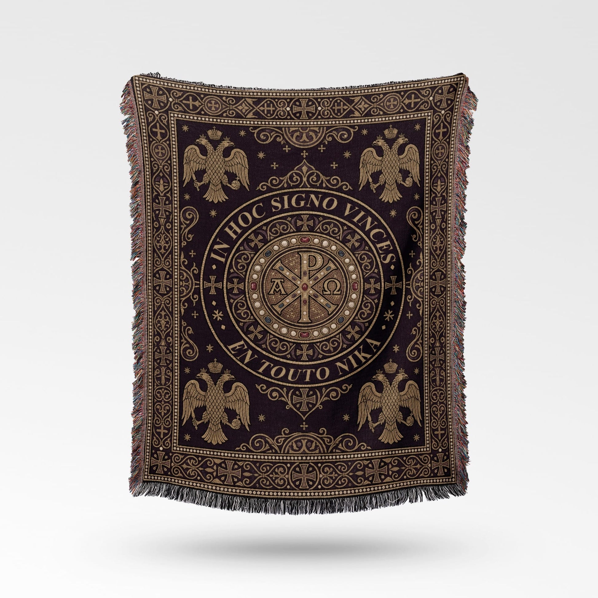 Ornate dark throw blanket with Byzantine eagle motifs and Greek inscription.