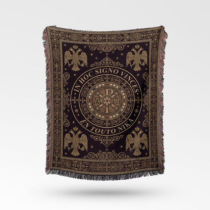 Ornate dark throw blanket with Byzantine eagle motifs and Greek inscription.
