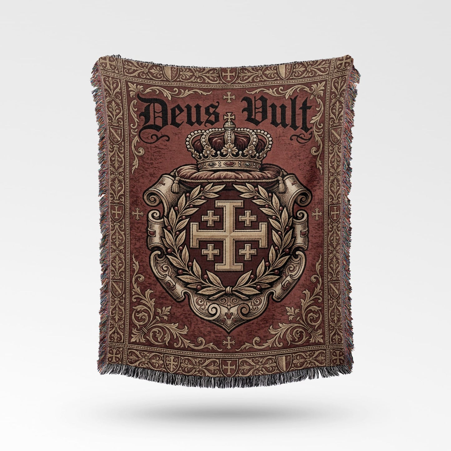 Tapestry blanket with "Deus Vult" text, crown, and a Jerusalem cross crest.