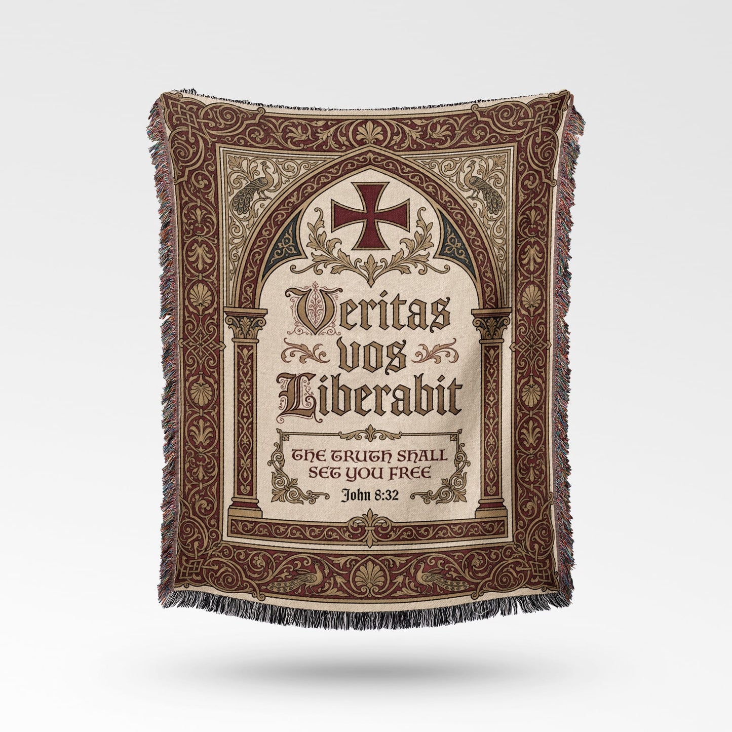 Ornate blanket with Latin inscription and cross.