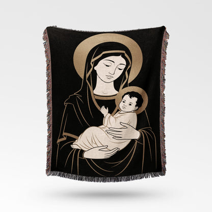 Madonna and Child illustration on a black woven throw blanket.