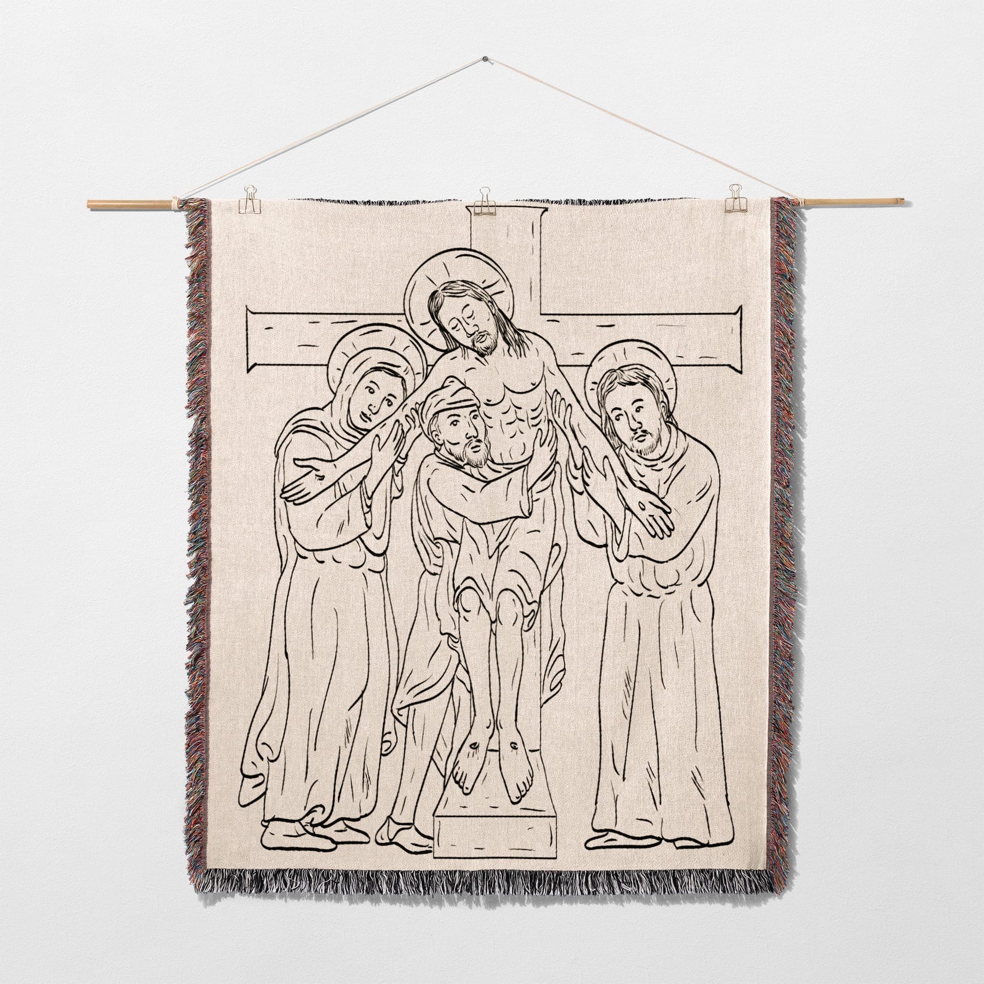 Tapestry depicting Jesus' descent from the cross with two figures supporting him.