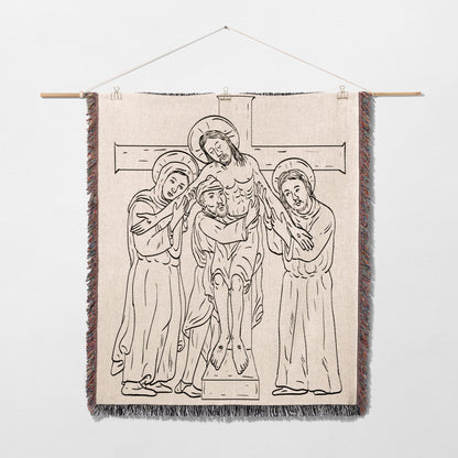 Tapestry depicting Jesus' descent from the cross with two figures supporting him.