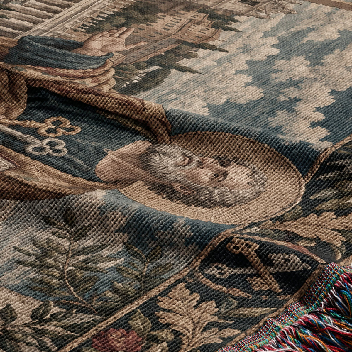 Folded woven tapestry featuring a classical scene with architectural elements and a figure's halo.
