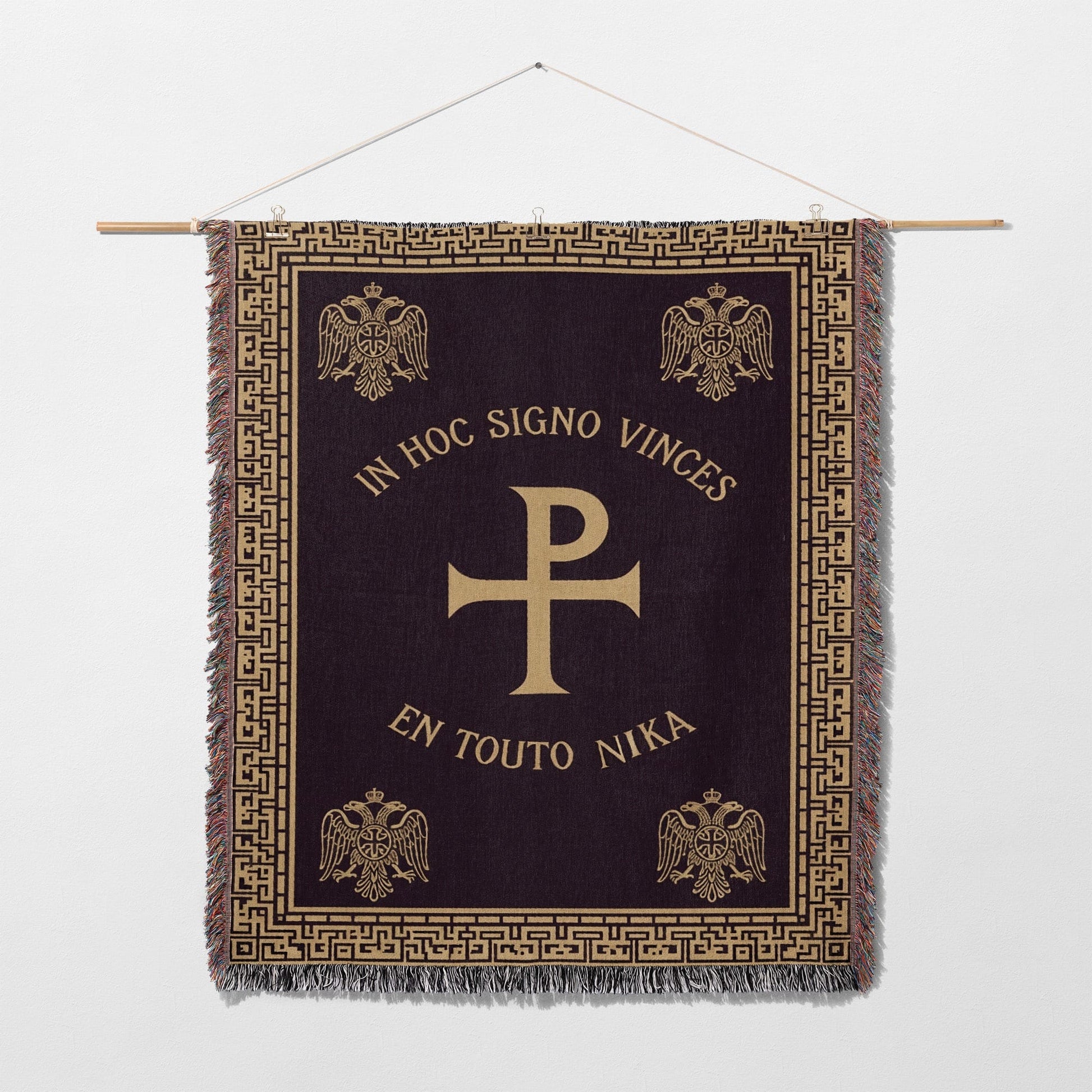 Tapestry with gold cross and eagles, reading "In Hoc Signo Vincis" and "En Touto Nika".