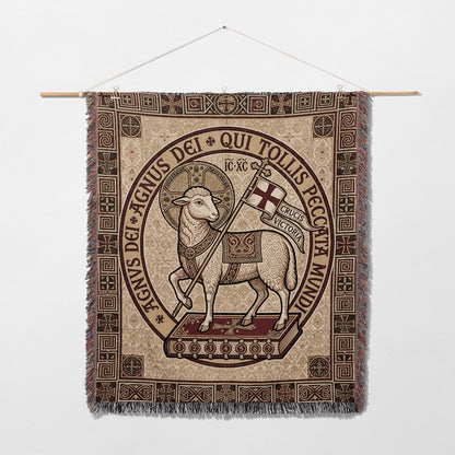 Tapestry of the Agnus Dei with Latin text and decorative border.