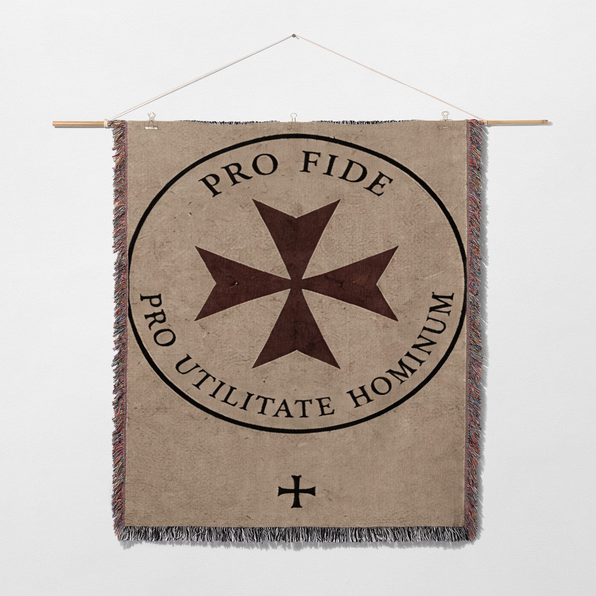 Tapestry with a Maltese cross and Latin text "PRO FIDE PRO UTILITATE HOMINUM".