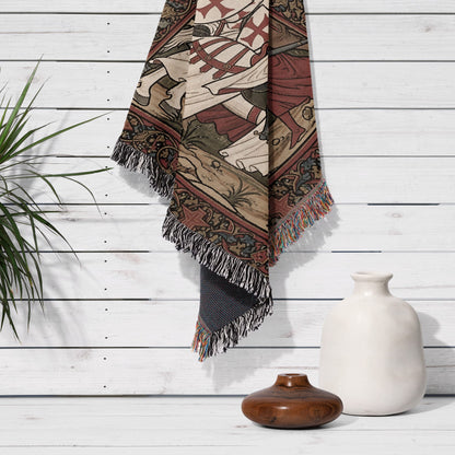 Woven tapestry with knight and horse design, fringed edges, displayed on white wood wall.