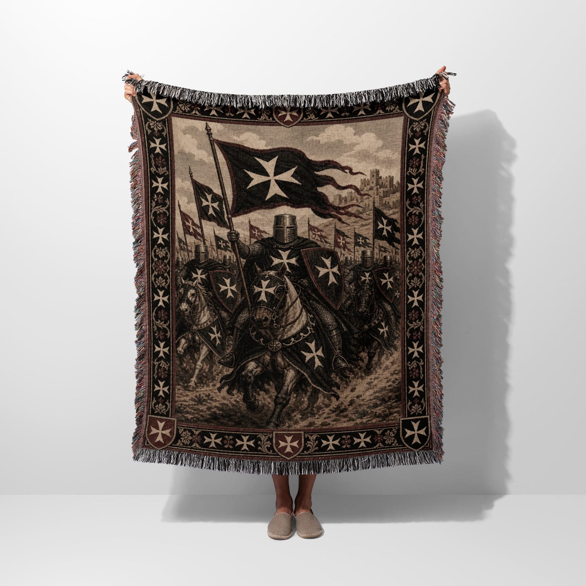 Knights Templar on horseback charging with swords under a banner.