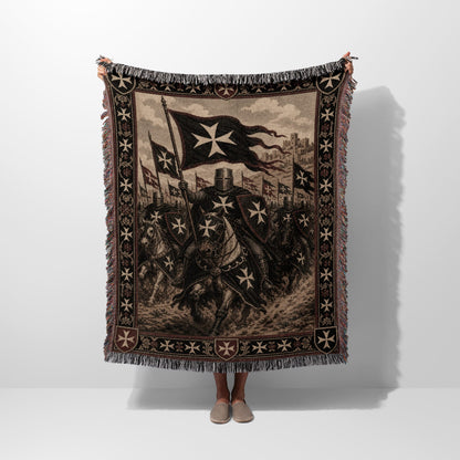 Knights Templar on horseback charging with swords under a banner.