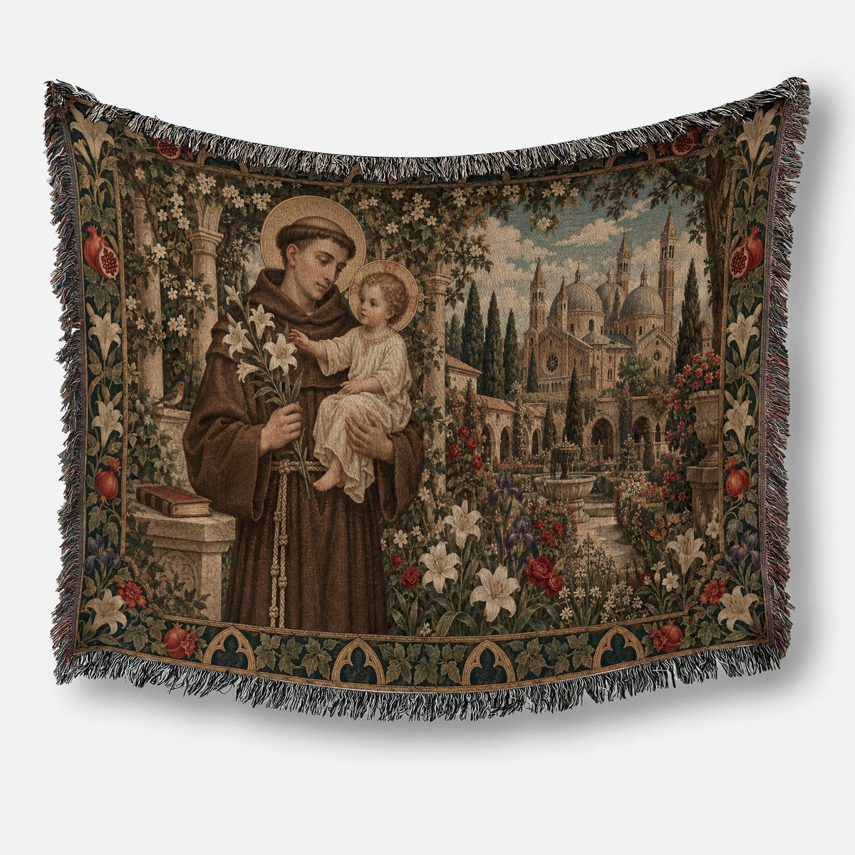 A woven tapestry featuring Saint Anthony holding the Christ Child amidst a garden with a European cathedral in the background.