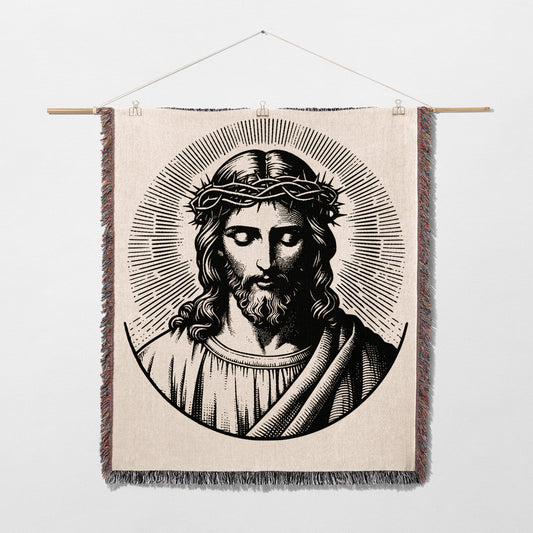 Jesus Christ wearing a crown of thorns, illuminated by a radiating halo.