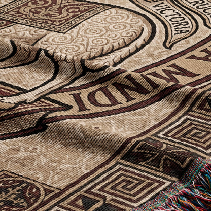 Brown blanket with intricate patterns and text "VICTORIA".