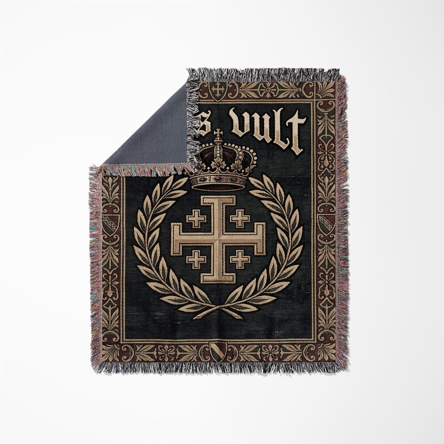 Dark tapestry blanket with a crown, Jerusalem cross, and gothic script.
