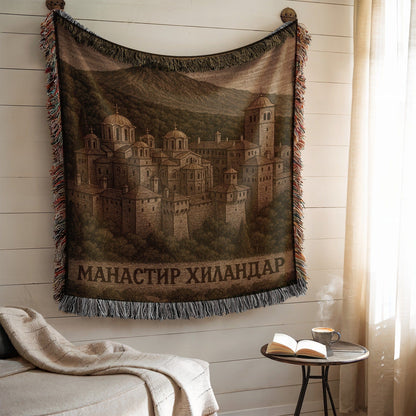 Scenic tapestry featuring a historic monastery design